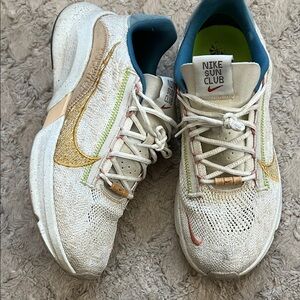 Nike Sun Club Women's White and Gold Sneakers